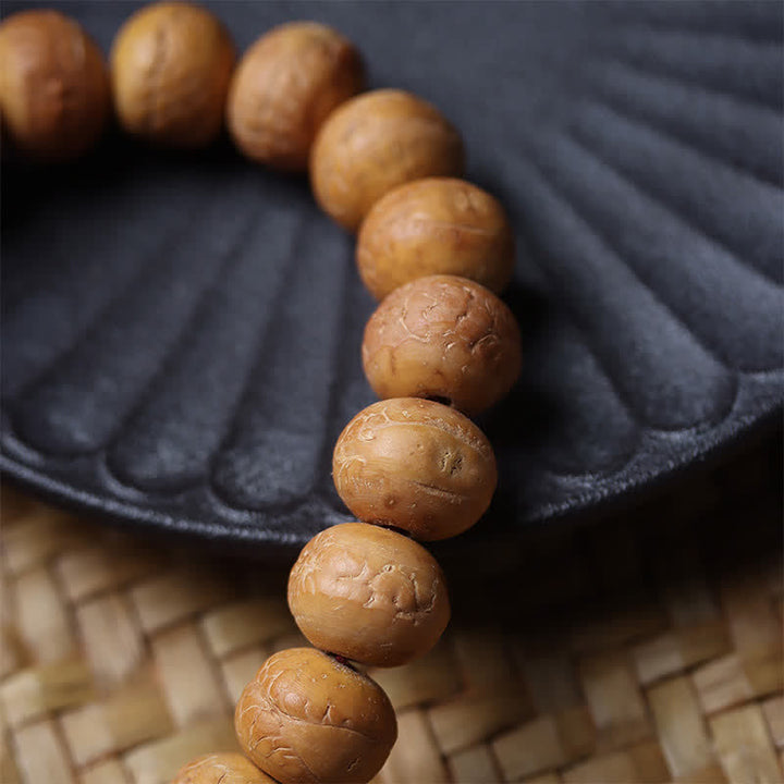 Buddha Stones Mala de muñeca tibetana con borla grabada y ojo de fénix y sabiduría Bodhi - image 9