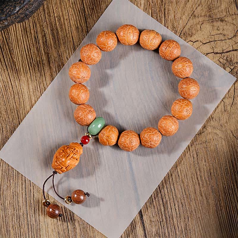 Buddha Stones Mala étnica tallada a mano con el símbolo del ojo de fénix y la sabiduría de Bodhi - Pulsera Ojo de Fénix Mala - 15 mm - Bodhi Ojo de Fénix (Protección♥Sabiduría) - image 1