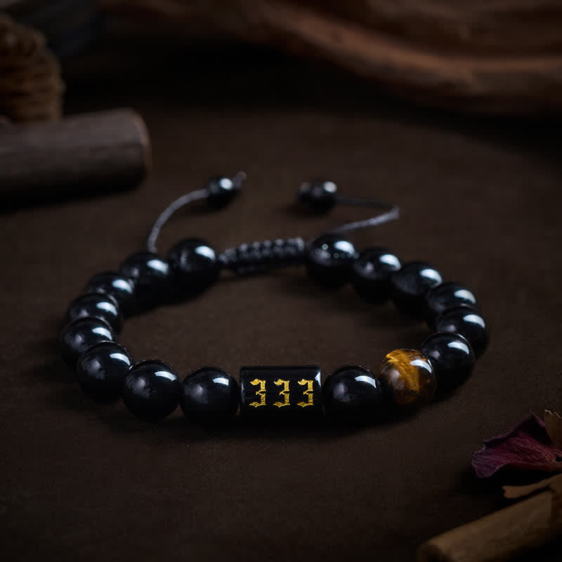 Buddha Stones Pulsera de fuerza y ​​plenitud con obsidiana negra natural y ojo de tigre, con número angelical - 333 (Circunferencia de la muñeca: 15-19 cm) - image 0
