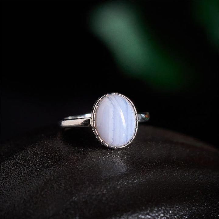 Buddha Stones Anillo de equilibrio redondo de ágata azul natural - Ágata de encaje azul natural (el color puede variar) - US 7 (ajustable) - image 0