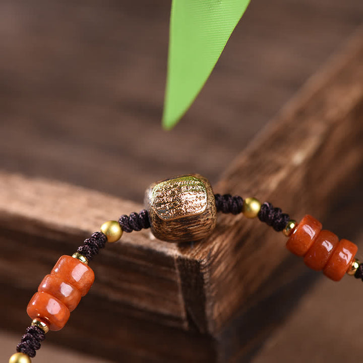 Buddha Stones Pulsera trenzada con borla de sándalo rojo tejida a mano con símbolo de bendición - image 9