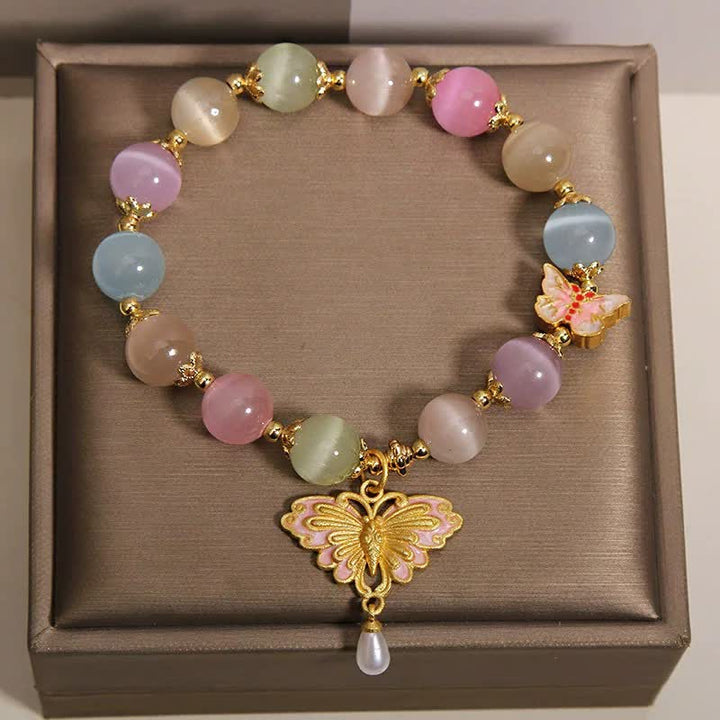 Buddha Stones Pulsera multicolor con cuentas de mariposa ojo de gato y amor - image 4