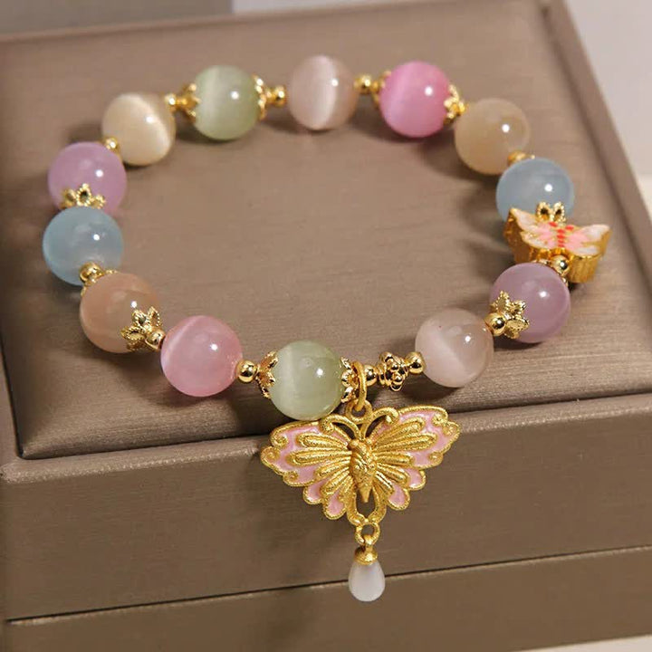 Buddha Stones Pulsera multicolor con cuentas de mariposa ojo de gato y amor - image 3
