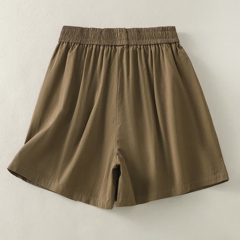Buddha Stones Shorts de verano informales para mujer con botones decorativos, color liso y bolsillos. - image 1