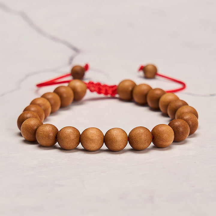 Buddha Stones Mala de muñeca de cuentas de sándalo tibetano para enraizar - image 4