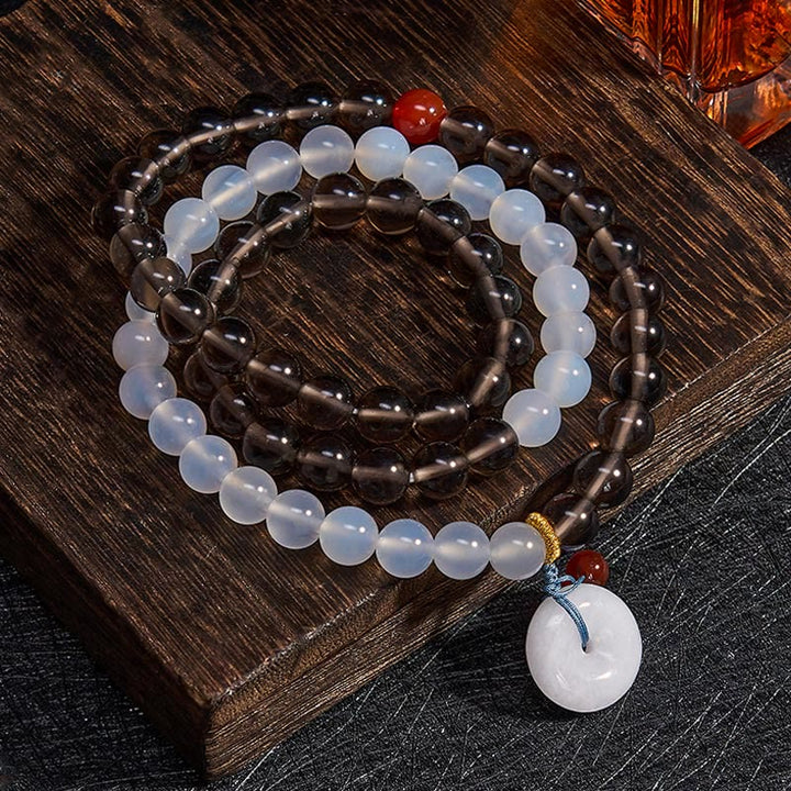 Buddha Stones Pulsera multienrollada con hebilla de paz de obsidiana de hielo y calcedonia blanca, modelo Serenity. - image 2