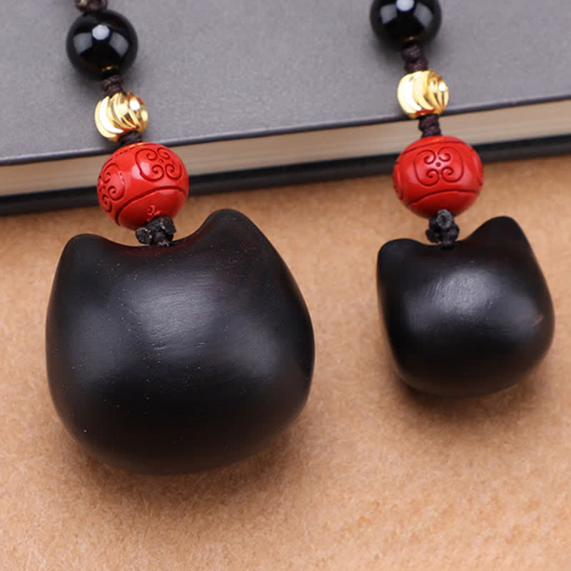 Buddha Stones Llaveros de madera de ébano con diseño de gato adorable, tallados a mano, símbolo de paz. - image 23