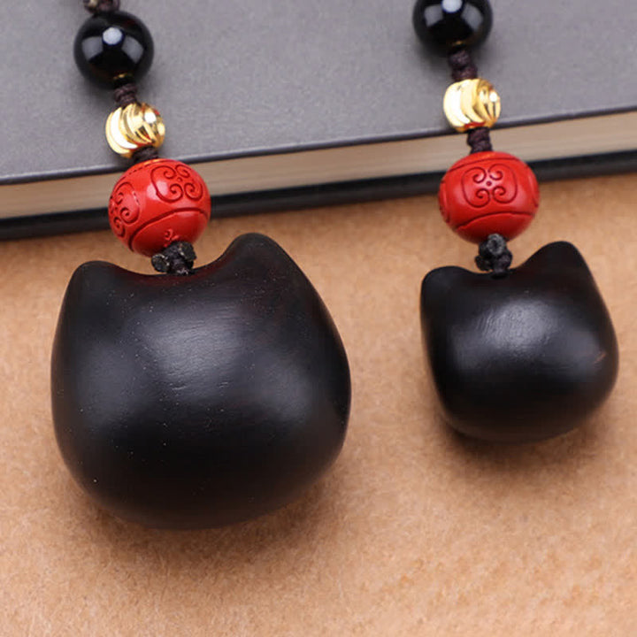 Buddha Stones Llaveros de madera de ébano con diseño de gato adorable, tallados a mano, símbolo de paz. - image 23