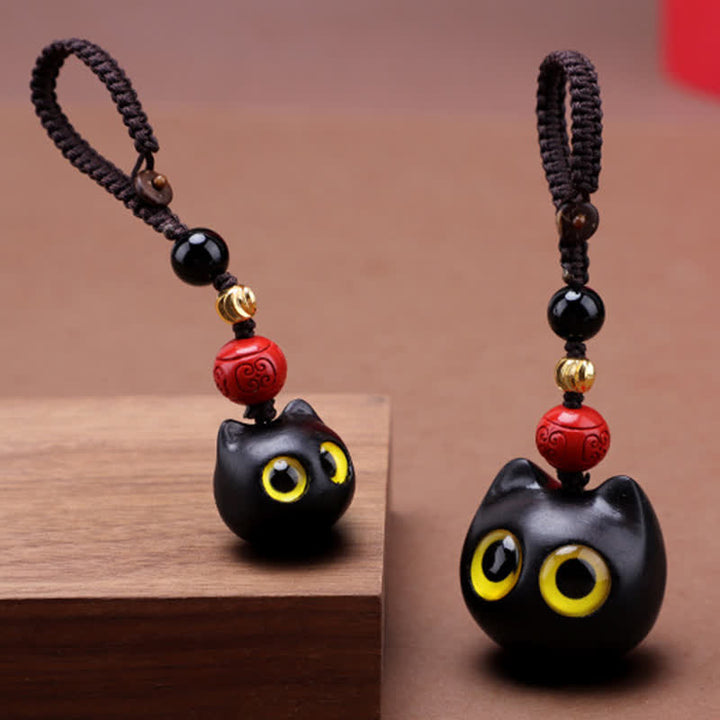 Buddha Stones Llaveros de madera de ébano con diseño de gato adorable, tallados a mano, símbolo de paz. - image 0