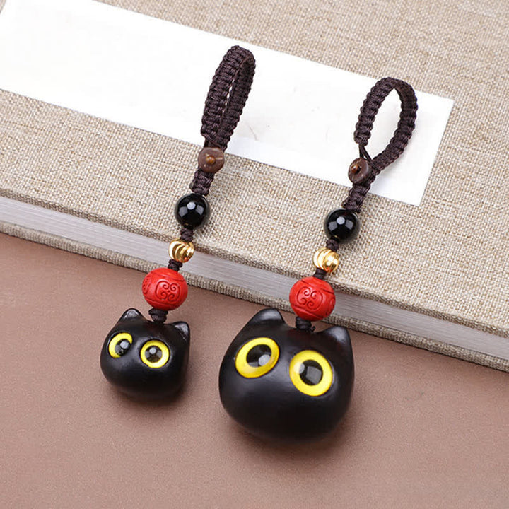 Buddha Stones Llaveros de madera de ébano con diseño de gato adorable, tallados a mano, símbolo de paz. - image 8