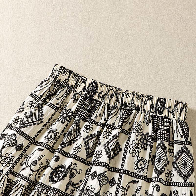 Buddha Stones Falda de mujer de estilo bohemio casual de verano en negro y beige con estampado geométrico floral. - image 3
