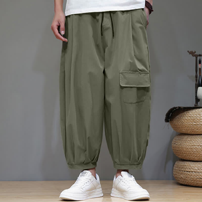 Buddha Stones Pantalones capri lisos de verano informales minimalistas con cordón ajustable para hombre, estilo harem con bolsillos. - image 1