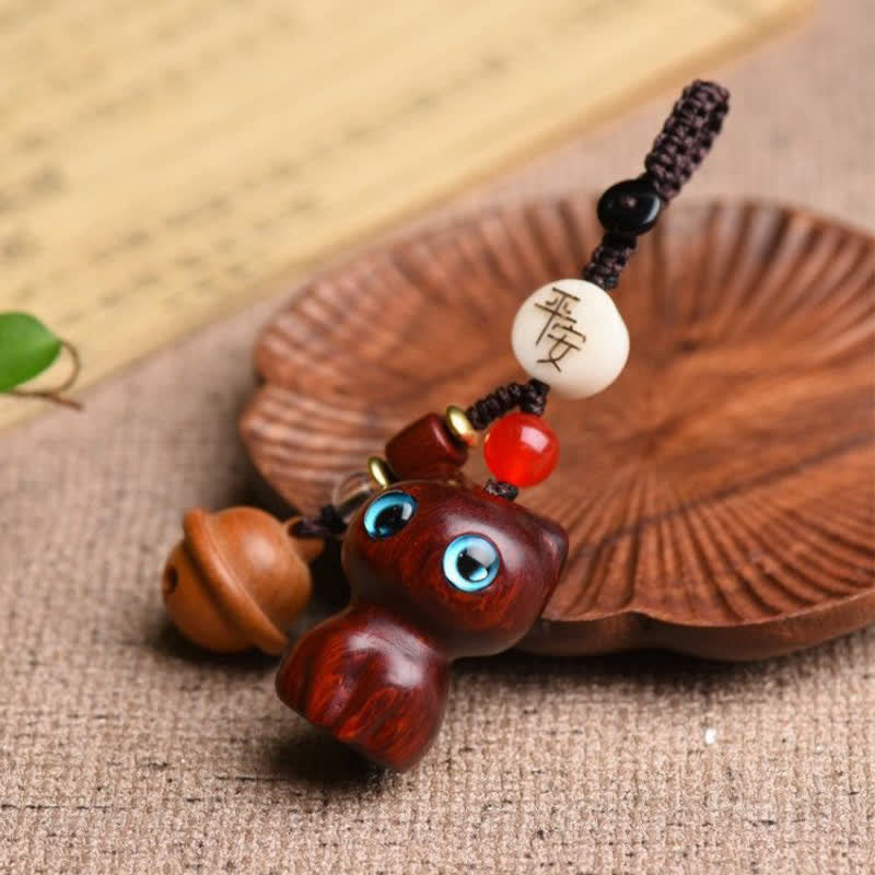 Buddha Stones Llaveros protectores con cascabel para gatos, tallados a mano en madera de ébano y sándalo rojo. - image 3