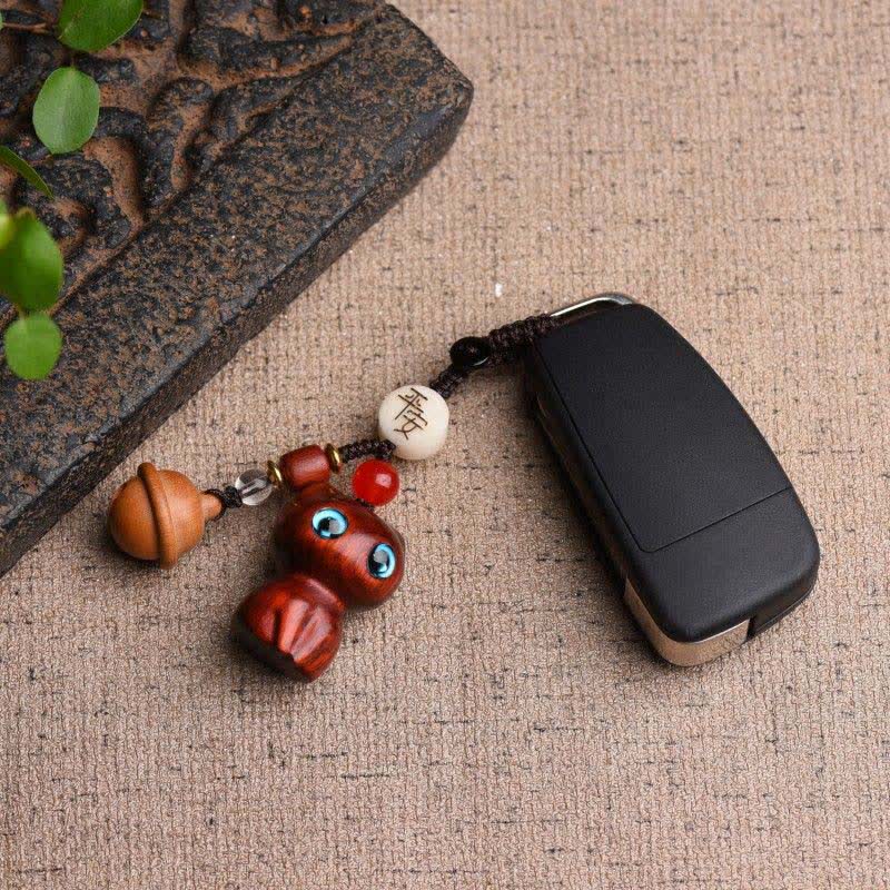 Buddha Stones Llaveros protectores con cascabel para gatos, tallados a mano en madera de ébano y sándalo rojo. - image 4