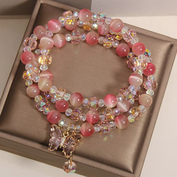 Buddha Stones Pulsera facetada triple con mariposa ojo de gato color melocotón - image 4