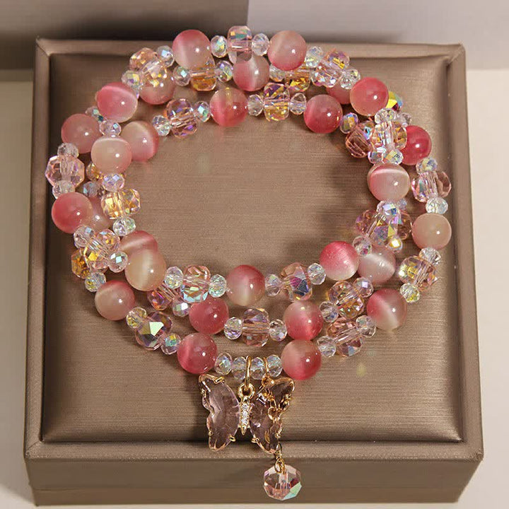 Buddha Stones Pulsera facetada triple con mariposa ojo de gato color melocotón - image 7