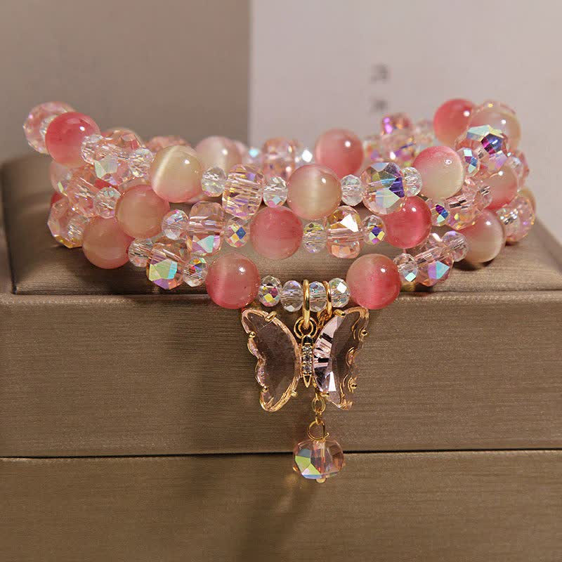 Buddha Stones Pulsera facetada triple con mariposa ojo de gato color melocotón - image 2