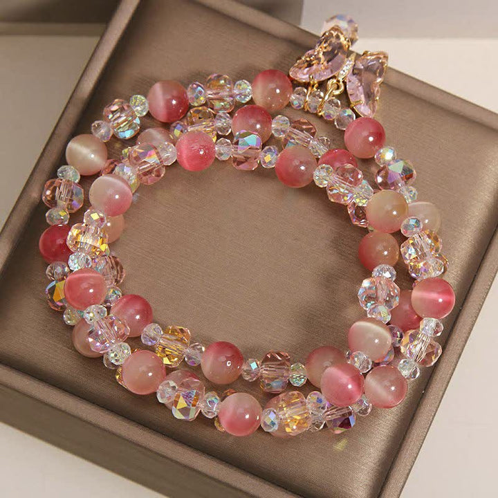 Buddha Stones Pulsera facetada triple con mariposa ojo de gato color melocotón - image 8