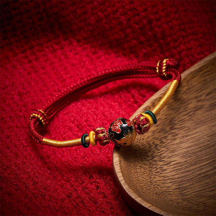 Buddha Stones Pulsera trenzada de hilo rojo con cuentas de dragón de cobre - Cordón rojo oscuro (circunferencia de la muñeca: 15–20 cm) - Cuenta del Dragón Negro - image 0