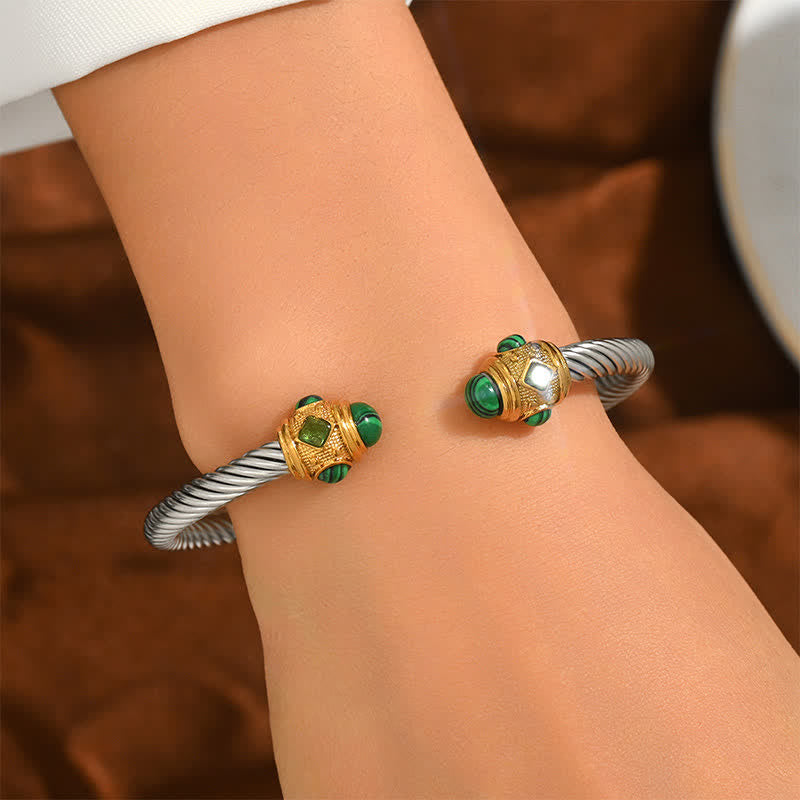 Buddha Stones Pulsera tipo brazalete bicolor de acero inoxidable con diseño de energía en espiral - image 1