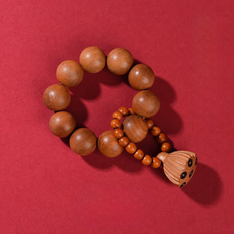 Buddha Stones Decoraciones de cuentas de meditación táctiles pulidas a mano con forma de vaina de loto y madera de durazno. - Madera de durazno (Protección ♥ Purificación) - image 1