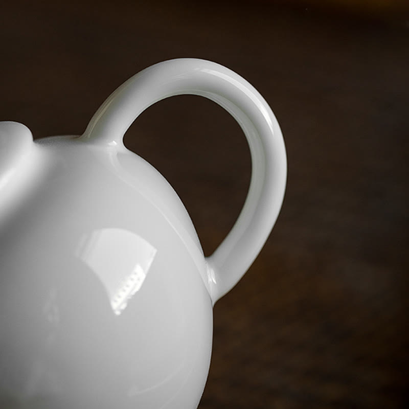 Tetera de cerámica con diseño grabado de bambú de pino ciruelo blanco