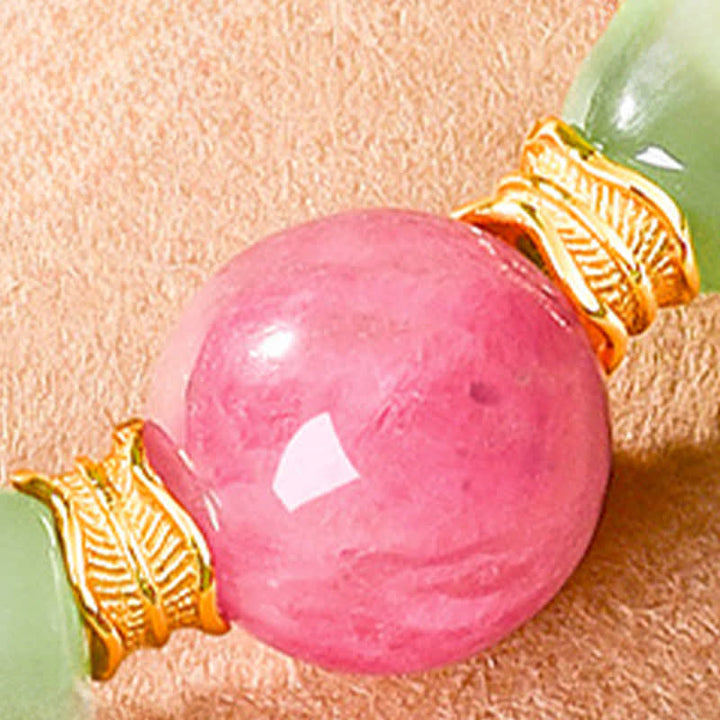 Buddha Stones Pulsera de rodonita con cuentas redondas de jade para la suerte - image 9