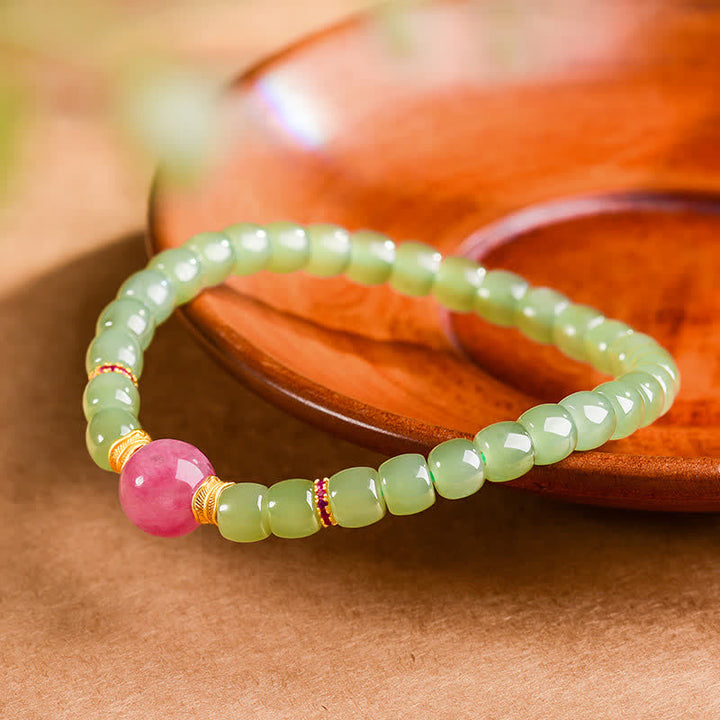Buddha Stones Pulsera de rodonita con cuentas redondas de jade para la suerte - image 2