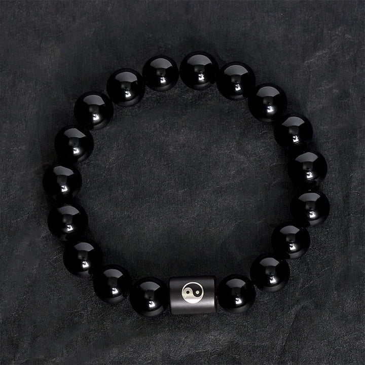 Buddha Stones Pulsera de cuentas cilíndricas con incrustaciones de madera de ébano y símbolo de equilibrio Yin Yang. - image 4