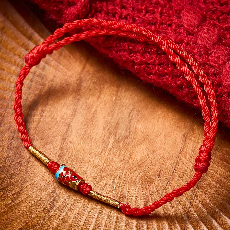 Buddha Stones Pulsera ajustable de cobre con dije de pez koi de la suerte, tejida a mano en hilo rojo. - image 1