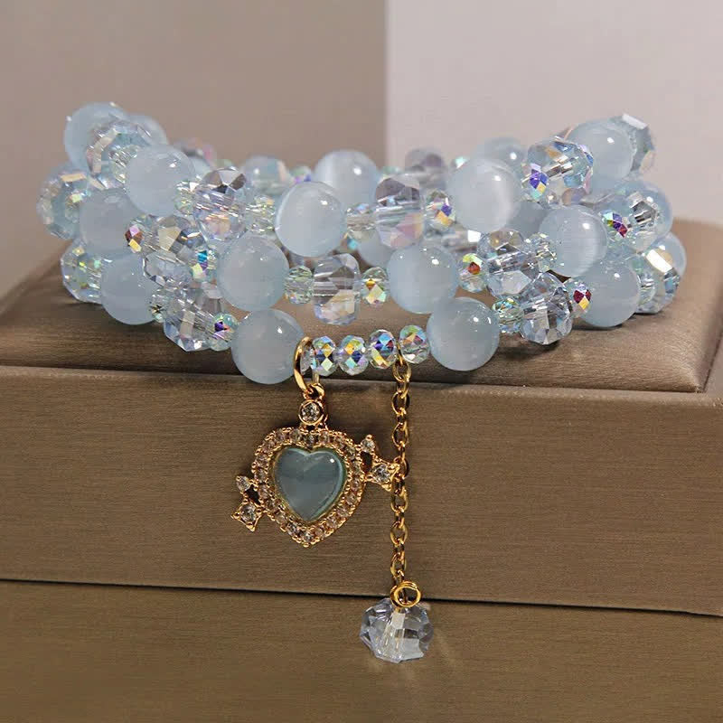 Buddha Stones Pulsera de confianza de triple vuelta con corazón de ojo de gato azul - image 1