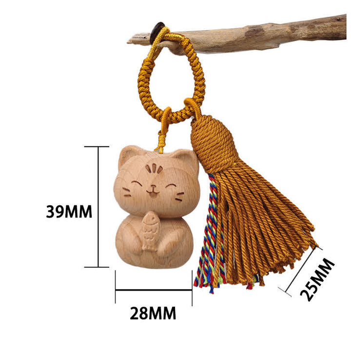 Buddha Stones Llaveros con borla de gato de la suerte, tallados a mano en madera clara. - Gato marrón comiendo pescado - image 17