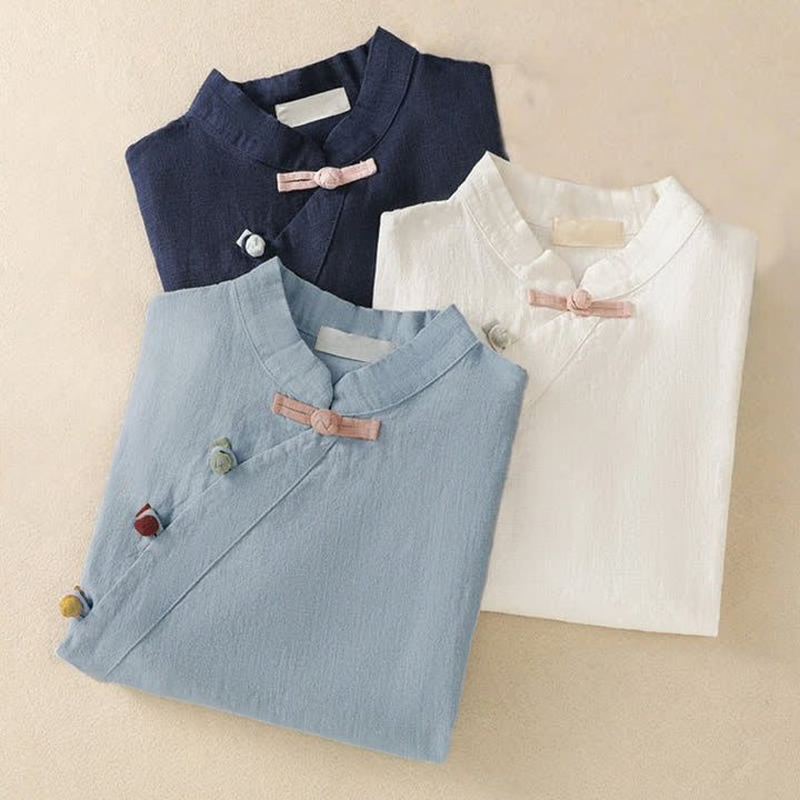 Camisa de manga tres cuartos de algodón y lino para mujer, estilo casual, con cuello alto inclinado y botones de Buddha Stones. - image 25