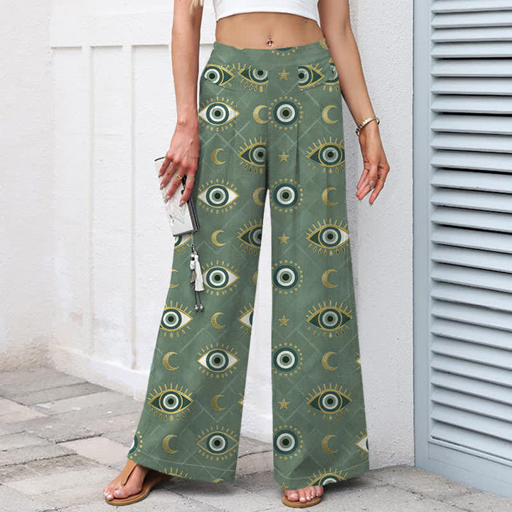 Buddha Stones Pantalones de mujer de lino y algodón con estampado de ojo turco y luna, cintura elástica, pernera ancha y bolsillos. - image 1
