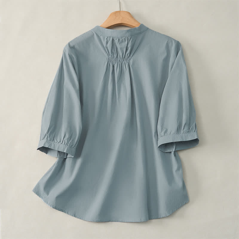 Camisa de mujer de manga tres cuartos con diseño de Buddha Stones y botones con cordones. - image 1
