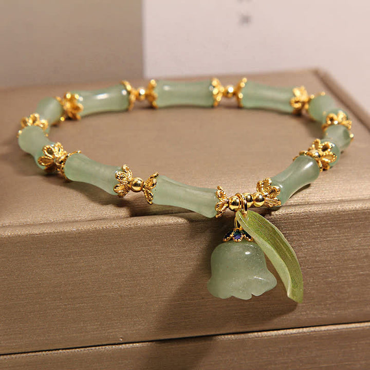 Buddha Stones Pulsera con dije de lirio del valle, aventurina verde y bambú para la buena suerte y el crecimiento. - image 5