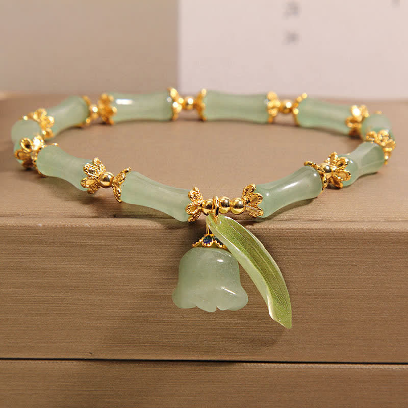 Buddha Stones Pulsera con dije de lirio del valle, aventurina verde y bambú para la buena suerte y el crecimiento. - Bambú (Resistencia ♥ Flexibilidad) - 5,91-6,29 pulgadas / 15-16 cm - image 0