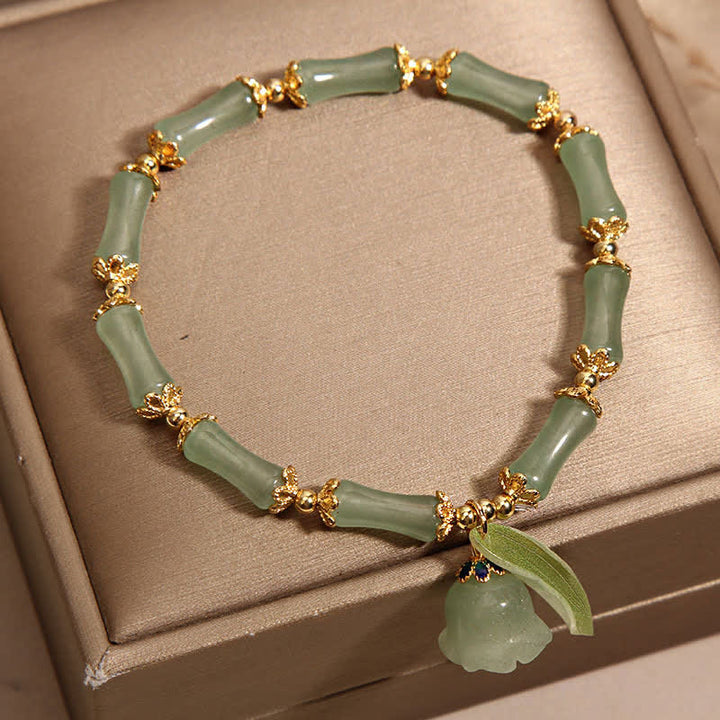 Buddha Stones Pulsera con dije de lirio del valle, aventurina verde y bambú para la buena suerte y el crecimiento. - image 2