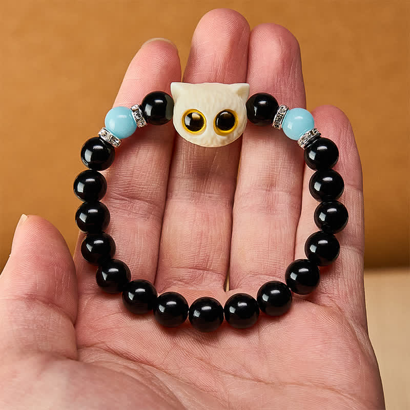 Buddha Stones Pulsera de cuentas con relieve de gato de ojos grandes tallada a mano en obsidiana negra - image 21