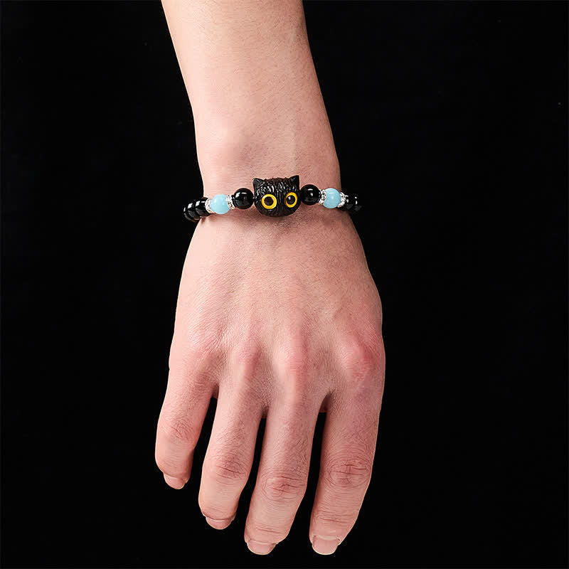Buddha Stones Pulsera de cuentas con relieve de gato de ojos grandes tallada a mano en obsidiana negra - image 5