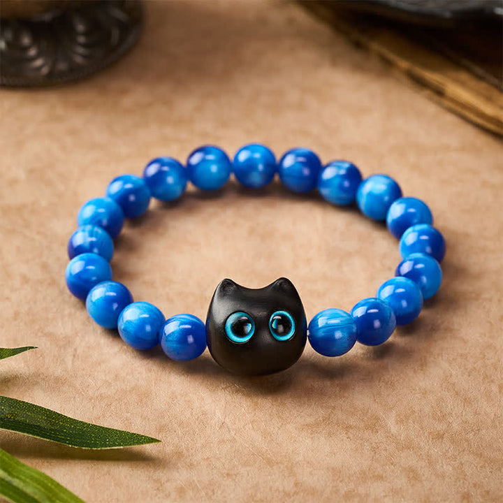 Buddha Stones Pulsera de equilibrio con forma de gato, cuentas de resina azul y madera de ébano - image 10