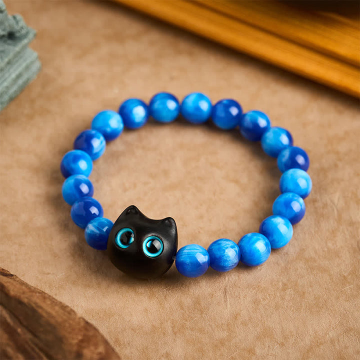 Buddha Stones Pulsera de equilibrio con forma de gato, cuentas de resina azul y madera de ébano - 10 mm (circunferencia de la muñeca: 6,3-6,7 pulgadas / 16-17 cm) - image 9