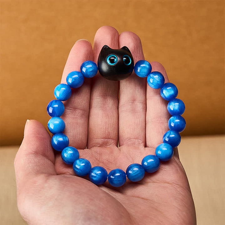 Buddha Stones Pulsera de equilibrio con forma de gato, cuentas de resina azul y madera de ébano - image 14