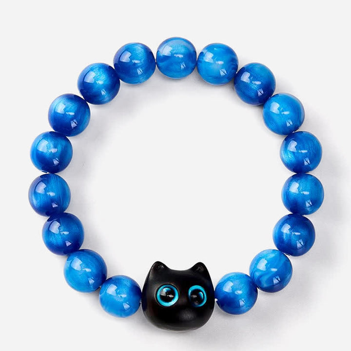 Buddha Stones Pulsera de equilibrio con forma de gato, cuentas de resina azul y madera de ébano - image 2