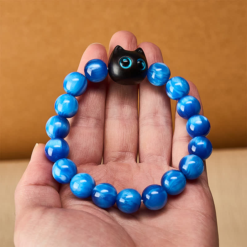 Buddha Stones Pulsera de equilibrio con forma de gato, cuentas de resina azul y madera de ébano - image 5