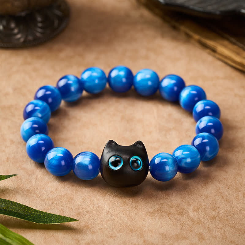 Buddha Stones Pulsera de equilibrio con forma de gato, cuentas de resina azul y madera de ébano - image 1