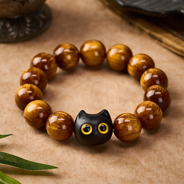 Buddha Stones Pulsera con cuentas de resina amarilla, ojos amarillos y diseño de gato tranquilo en madera de ébano. - image 10