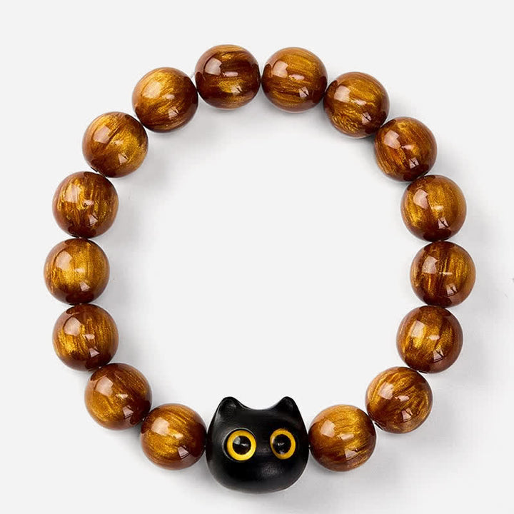 Buddha Stones Pulsera con cuentas de resina amarilla, ojos amarillos y diseño de gato tranquilo en madera de ébano. - image 2