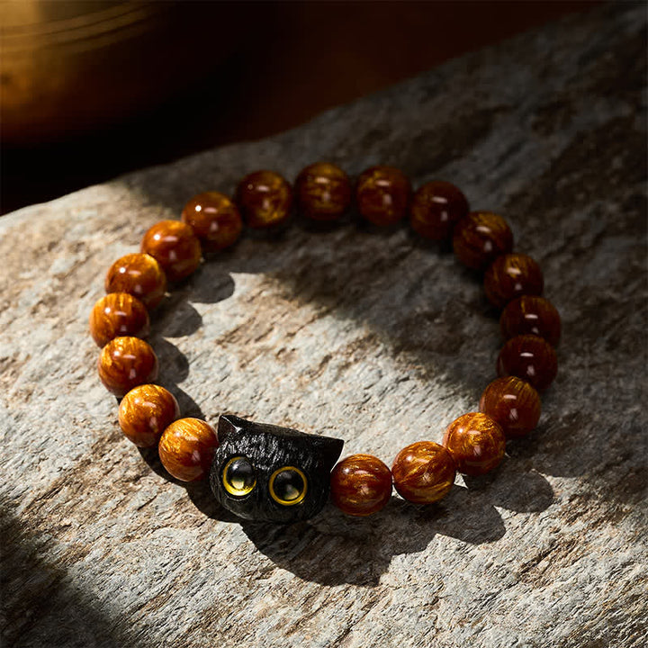 Buddha Stones Pulsera de madera de ébano con cuentas de resina amarilla y gato de la paz - image 2