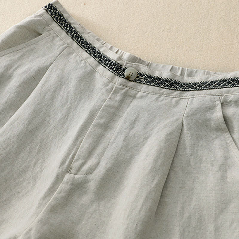 Pantalones de mujer con Buddha Stones, color liso, cierre frontal, cintura elástica y bolsillos. - image 2